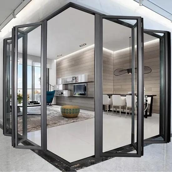 Folding door system opening a hotel restaurant to a terrace