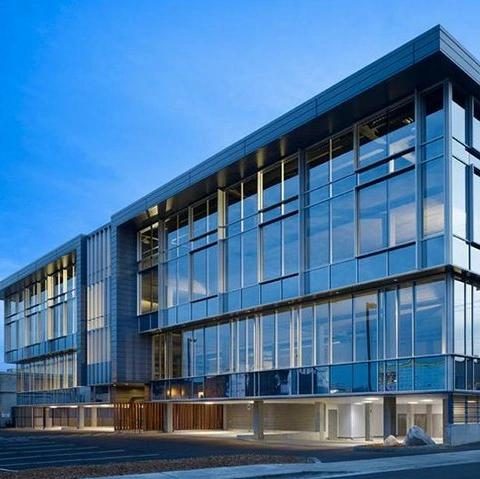 Commercial office building with full height aluminium curtain wall glazing